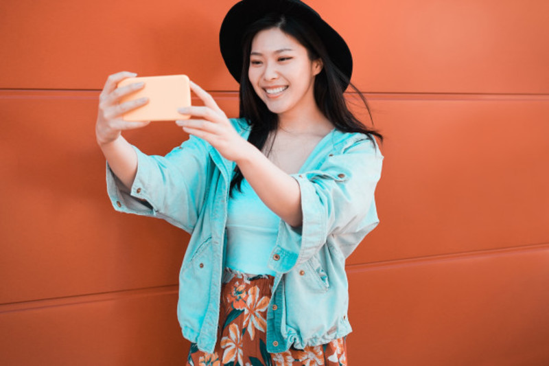 Asian Social Influencer Woman Using Smartphone With Coral Happy Chinese Girl Having Fun With New Trends Technology 166273 38
